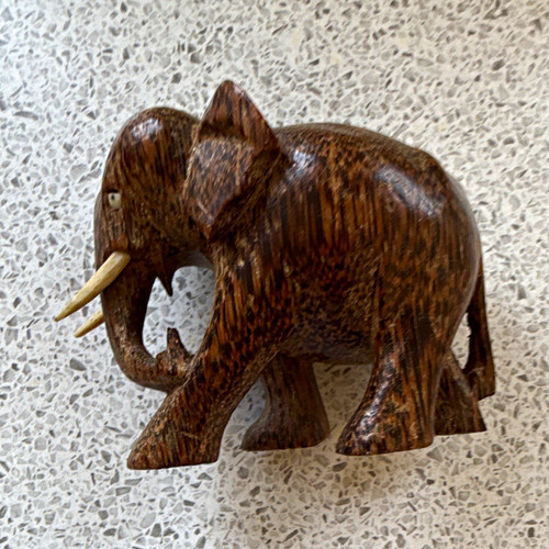 Hand carved wooden elephant - hand,