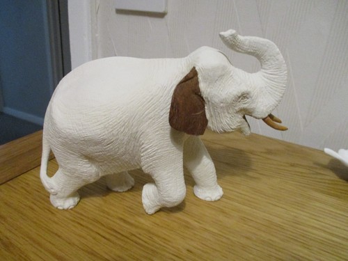 Painted wooden elephant - painted,
