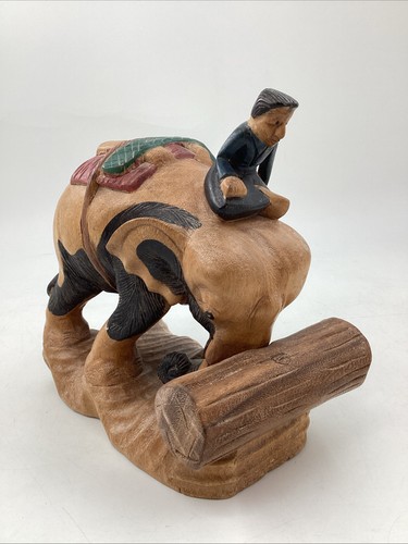 Hand carved wooden elephant - hand,