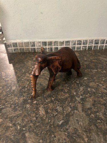 Hand carved wooden elephant - hand,