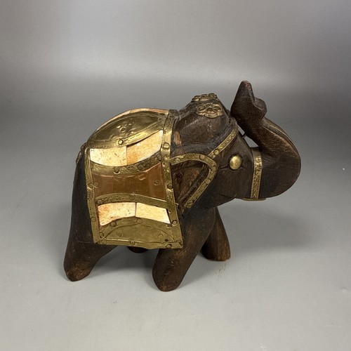 Wooden hand carved elephant - hand,