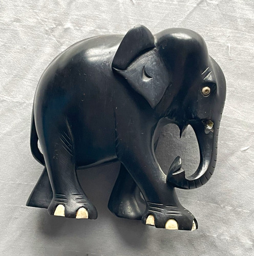 Carved black wooden elephant - wooden,