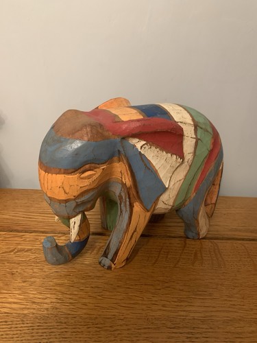 Hand carved and painted - carved,