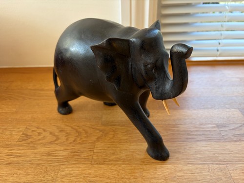 Hand carved wooden elephant - hand,