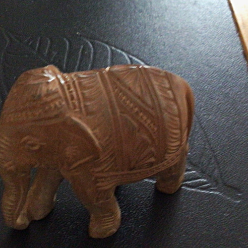 Carved wood elephant figurine - carved,