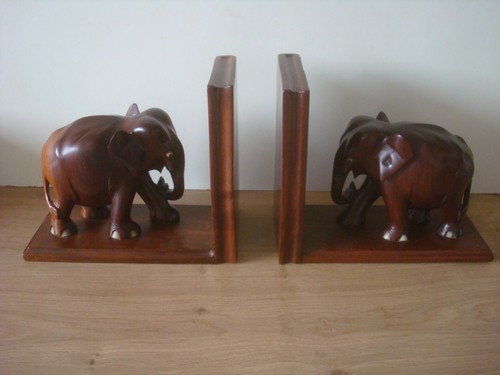 Carved wooden elephant - wooden, book